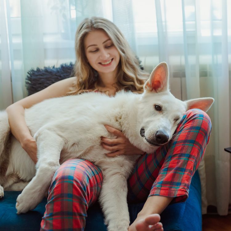 Woman and white dog